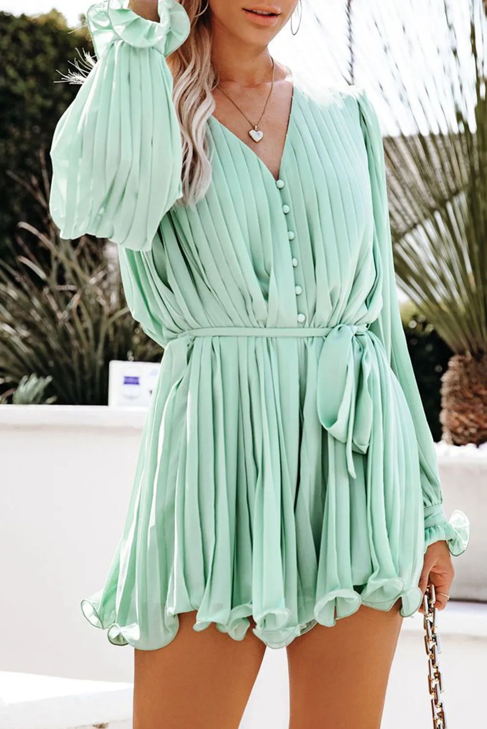 Chic Green Pleated V-Neck Romper with Ruffle & Tie Waist Detail