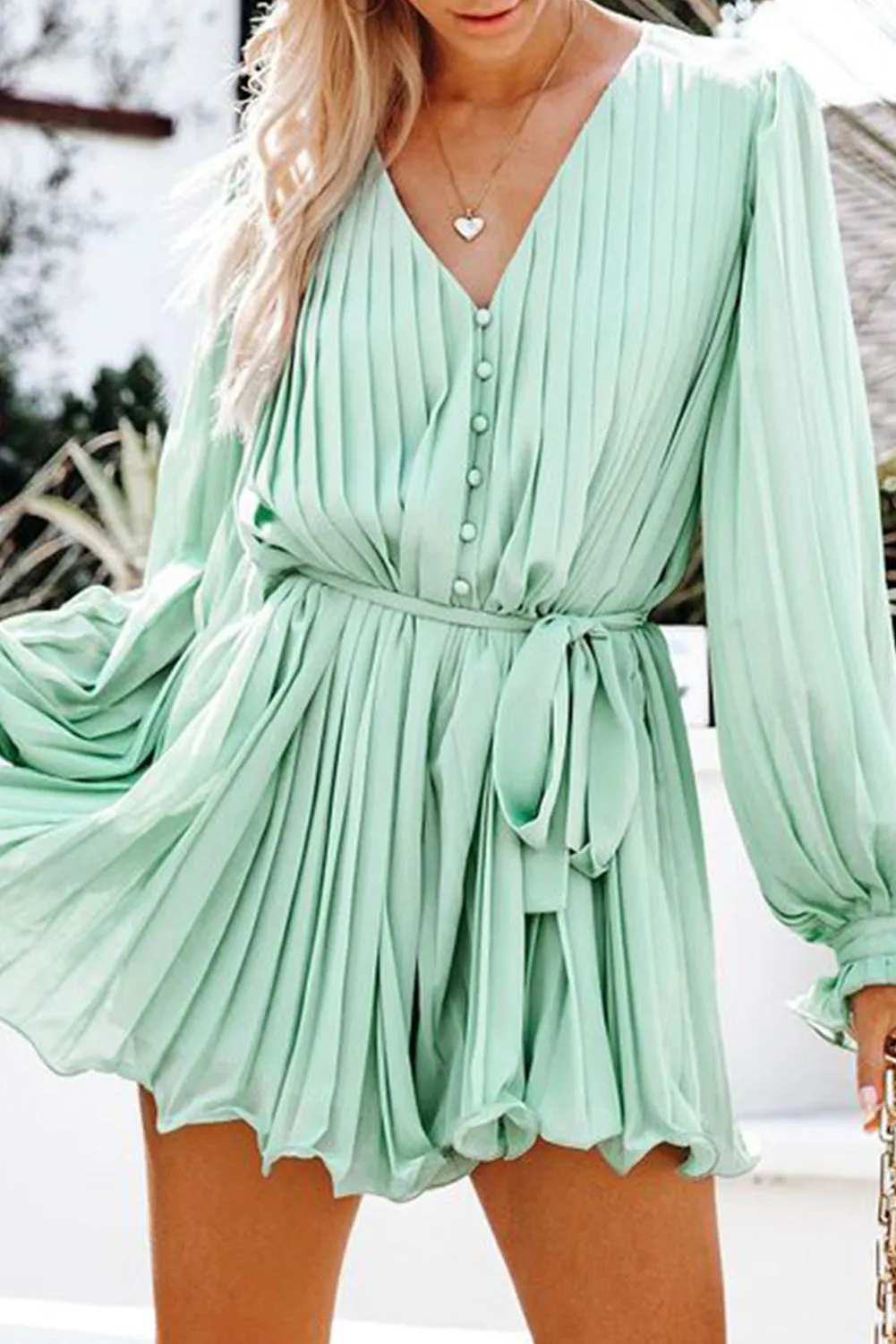 Chic Green Pleated V-Neck Romper with Ruffle & Tie Waist Detail